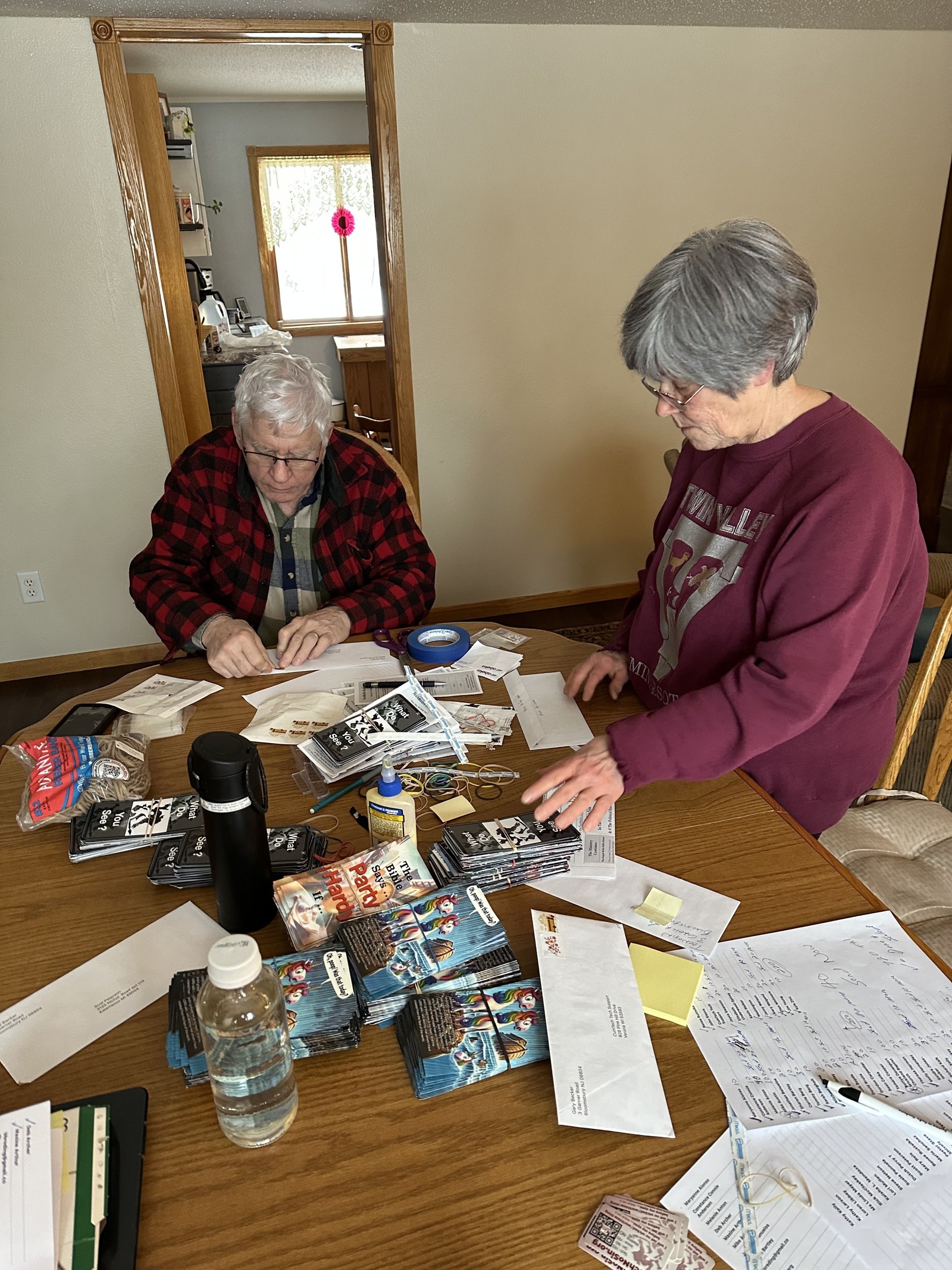 Derek and Brenda Claypool folding a previous TechNoSin Update