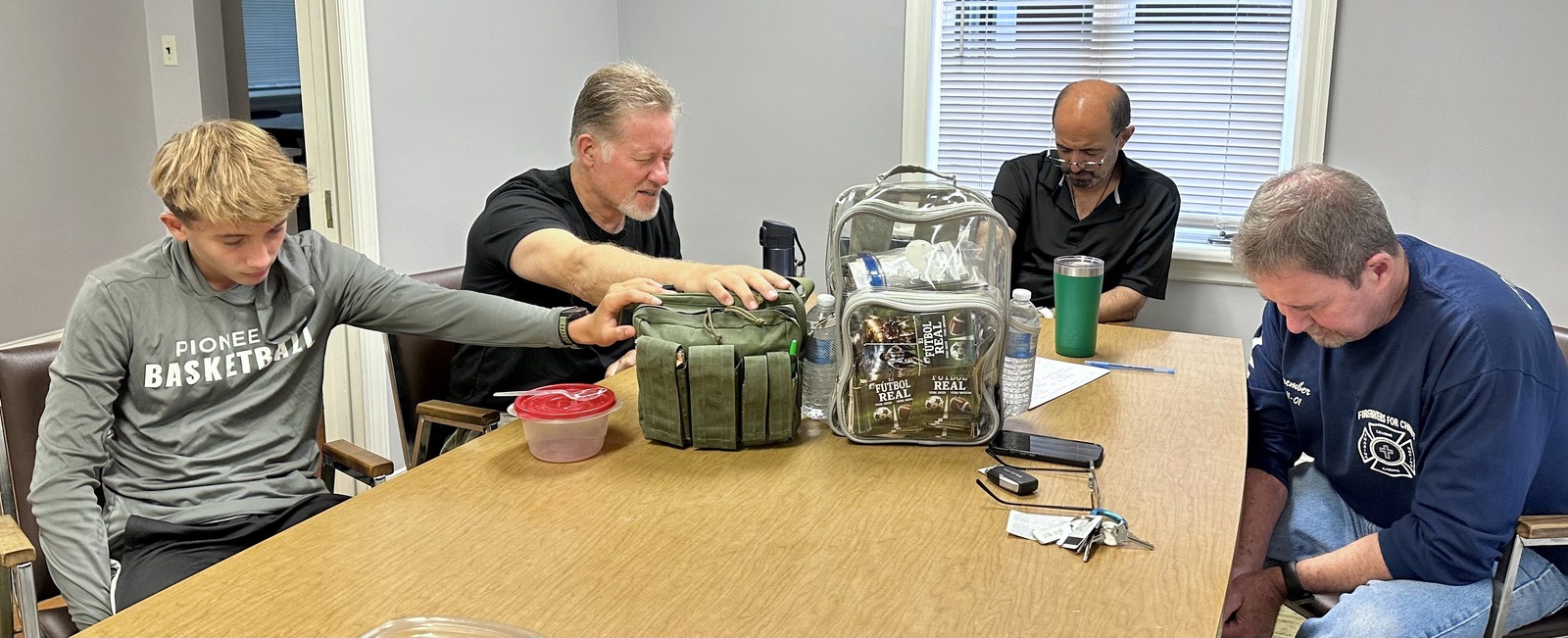 The team preparing Gospel pamphlets for World Cup outreach